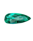 GIA certified Pear shaped loose Colombian emerald, right side table and crown close view