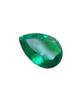 Pear cut natural loose Colombian emerald showcasing a vibrant, crystalline deep bluish-green hue.
