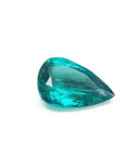 Pear cut loose colombian emerald for sale, front right position table and crown view
