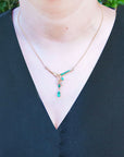 Ladies' 14k yellow gold emerald necklace pear shaped, marquises and round cut emeralds with natural diamonds