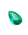 Pear cut natural loose colombian emerald muzo mine, features a vibrant medium-deep bluish-green hue and great brilliance,