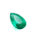 Pear cut natural loose colombian emerald muzo mine, features a vibrant medium-deep bluish-green hue and great brilliance,