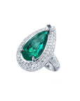 Pear-shaped 3.35 ct. emerald engagement ring in 14K white gold with diamond halo.
