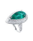 Pear-shaped 3.35 ct. emerald engagement ring in 14K white gold with diamond halo.