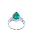 1.43 ct teardrop emerald engagement ring in 14K white gold with natural diamond halo and accents.