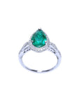 1.43 ct teardrop emerald engagement ring in 14K white gold with natural diamond halo and accents.