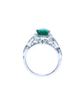1.43 ct teardrop emerald engagement ring in 14K white gold with diamond halo and filigree band.