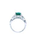 1.43 ct teardrop emerald engagement ring in 14K white gold with diamond halo and filigree band.