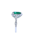 1.43 ct teardrop emerald engagement ring in 14K white gold with diamond halo and accents.