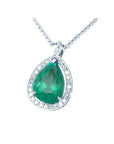 8.64 ct. pear-shaped emerald pendant with diamond halo in 14K white gold.
