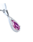 Right profile view of a pear cut pink sapphire necklace Slider pendant halo diamonds in 18k white gold.
