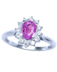Sapphire ring for women in 14k white gold, features a natural pink sapphire with a radiant oval cut, surrounded by a halo of prong-set natural diamonds.