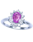 Sapphire ring for women in 14k white gold, features a natural pink sapphire with a radiant oval cut, surrounded by a halo of prong-set natural diamonds.