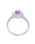 14K white gold women's ring with oval pink sapphire and diamond halo.