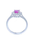 14K white gold women's ring with oval pink sapphire and diamond halo.