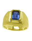 Men's Sapphire Pinky Ring 1.13 carats with a medium dark blue hue, cut in a rectangular emerald shape crafted in 14k Yellow Gold.
