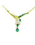 14K yellow gold necklace with marquise and pear-shaped Colombian emeralds and diamonds.