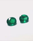 Matched pair oval cut loose emeralds
