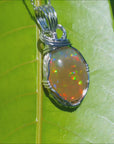 7.67 ct. Ethiopian Opal Pendant Vibrant Full Play of Colors Wire Wrap Silver