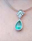 Pear shaped emerald necklace enhancer