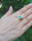 Men's gold ring with emerald