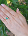 Women's emerald ring side baguette diamond