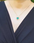 Natural colombian emerald heart pendant in 18k yellow gold.