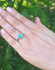 Three stone emerald rings for women