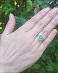 Cushion cut emerald ring