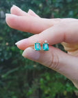Women's emerald and diamond stud earrings