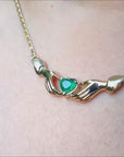 Emerald claddagh necklace yellow gold