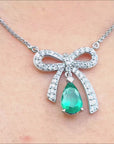 Bow-tie Emerald necklace
