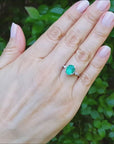 Oval cut women's natural emerald ring