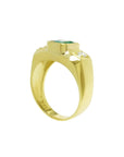 Men's 18K yellow gold ring with a bezel-set emerald and two accent diamonds.