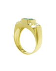 Men's 18K yellow gold ring with a bezel-set emerald and two accent diamonds.