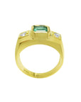 Men's 18K yellow gold ring with a rectangular green emerald and two accent diamonds.