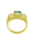 Men's 18K yellow gold ring with a rectangular green emerald and two accent diamonds.