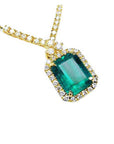 Women's emerald necklace emerald-cut natural deep green bluish color, encircled by a halo diamond high quality