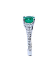 1.38 ct. round emerald ring with side diamonds in 14K white gold.