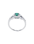Round cut emerald halo ring with natural diamonds set in 14K white gold.