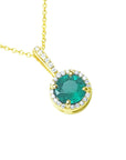 The topside view of a yellow gold natural colombian emerald round cut with halo diamond,