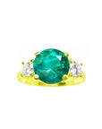 GIA certified F1 round Colombian emerald three-stone ring with accent diamonds in 18K yellow gold.