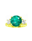 GIA certified F1 round Colombian emerald three-stone ring with accent diamonds in 18K yellow gold.