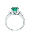 This white gold emerald engagement ring shows the lateral gallery and shank profile view.
