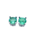 Pair of natural colombian emerald stud earrings made of 14k white gold and push backs.