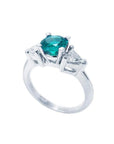 1.00 ct. round emerald ring with trillion side diamonds in 14K white gold.
