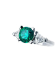 1.00 ct. round emerald ring with trillion side diamonds in 14K white gold.
