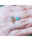 1.09 ct. round natural Colombian emerald stud earrings in 14K gold basket settings with push backs.