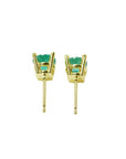 Pair of 1.09 ct. round natural Colombian emerald stud earrings in 14K gold basket settings with push backs.