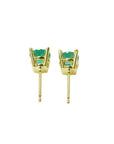 Pair of 1.09 ct. round natural Colombian emerald stud earrings in 14K gold basket settings with push backs.